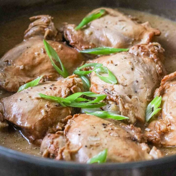 A closeup of Adobo Sa Gata in the pan it was cooked in.