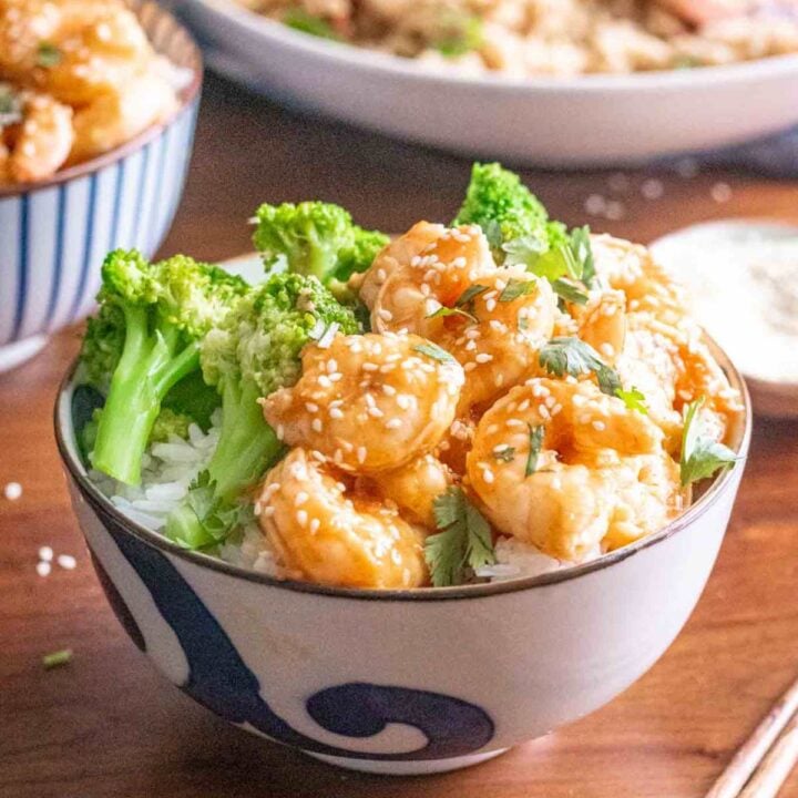 bowl of broccoli and sriracha shrimp.