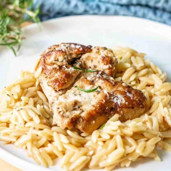 Plate of rosemary chicken and orzo.